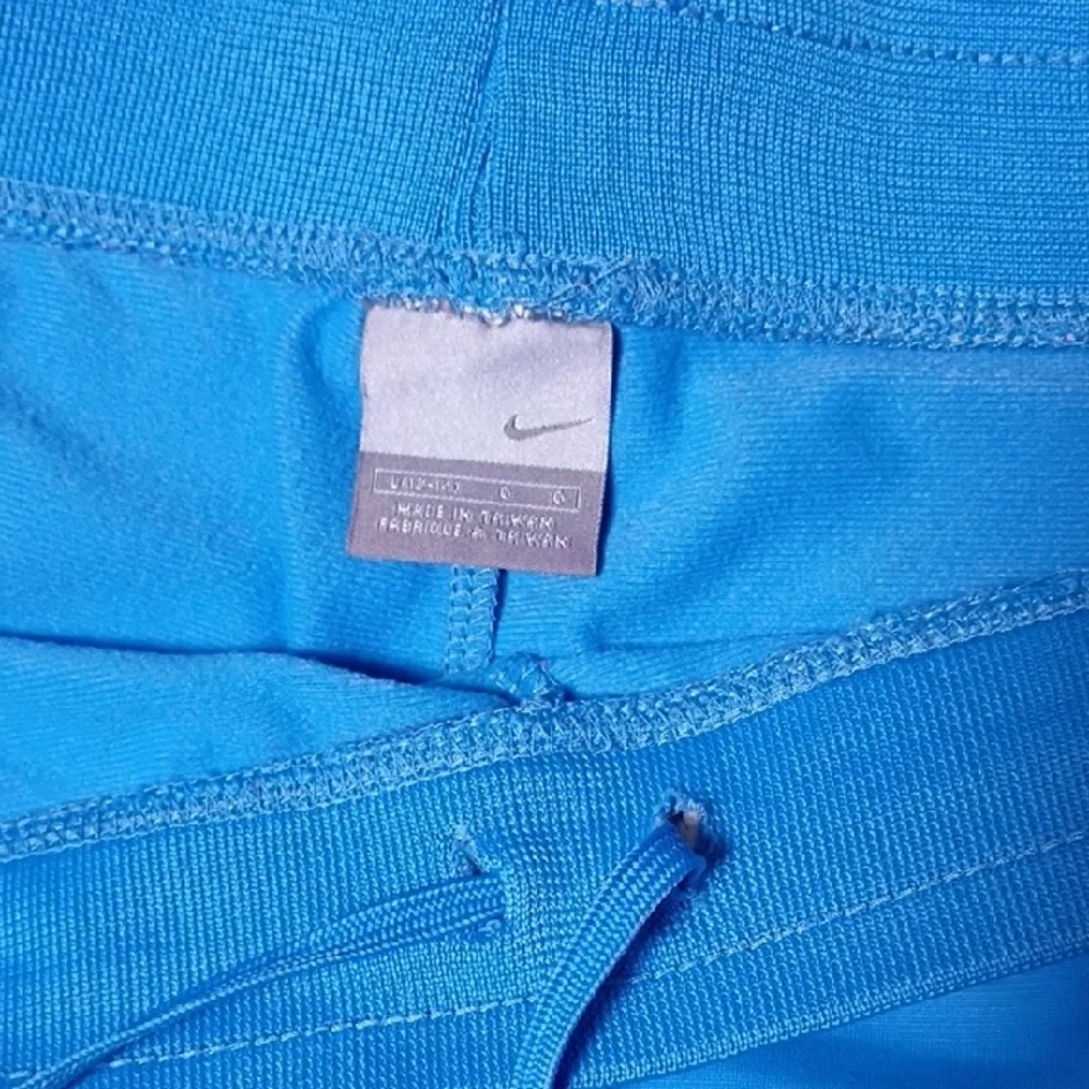 Nike Women's Light Blue Straight Leg Pants‎